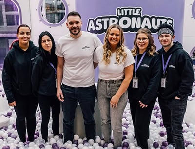 Little Astronauts team group photo in Hull indoor play center with staff members