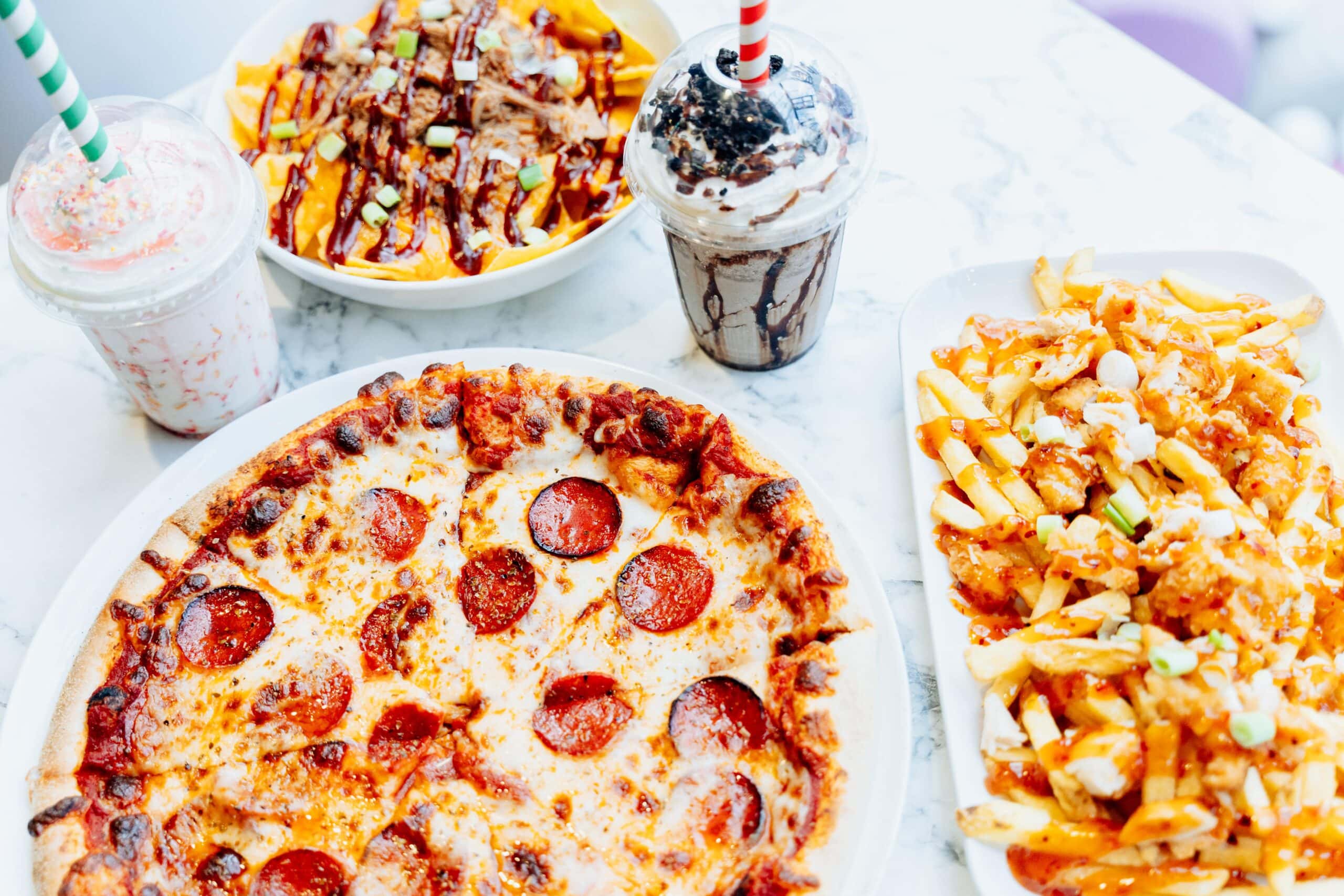 Pepparoni Pizza with loaded Fries and Milshakes