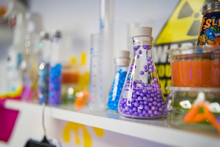 A child mixing colourful slime at Planet Gloop