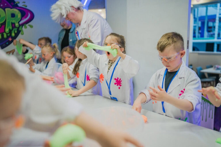 A birthday group making slime together at Planet Gloop